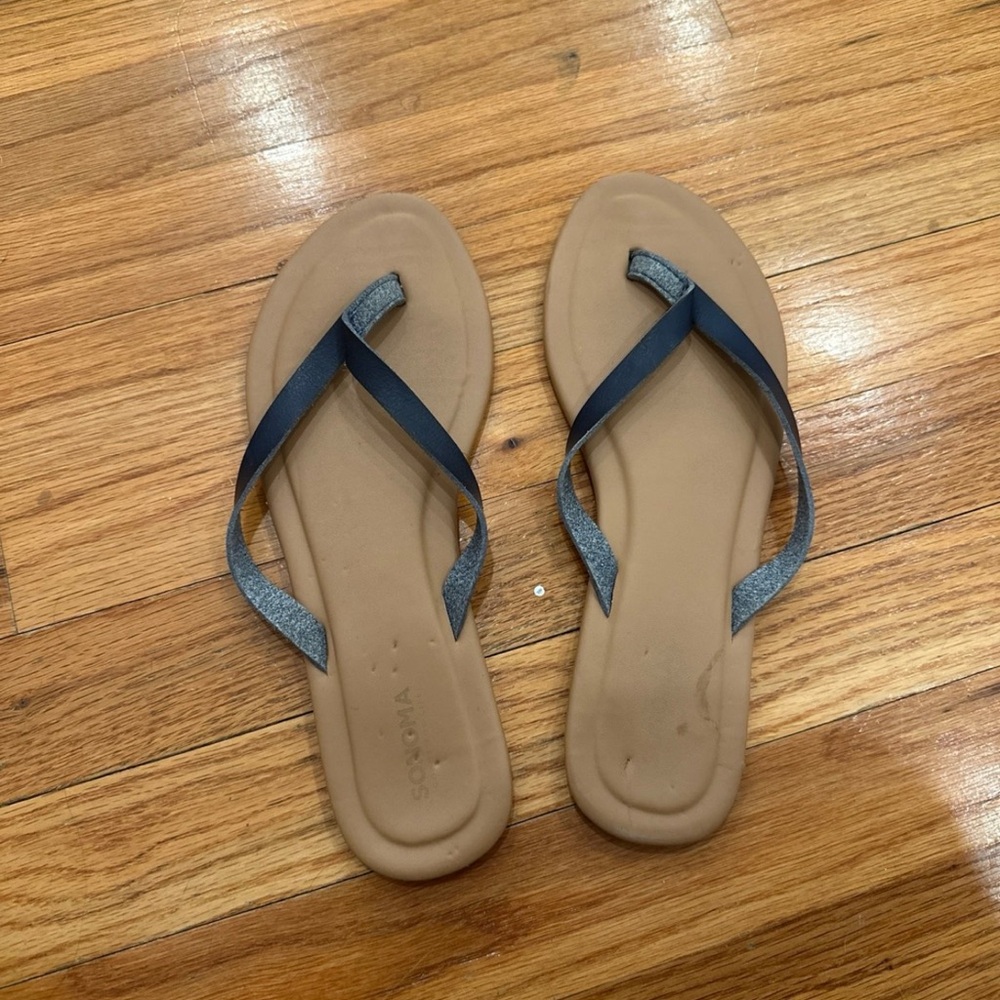 Brown flip flops